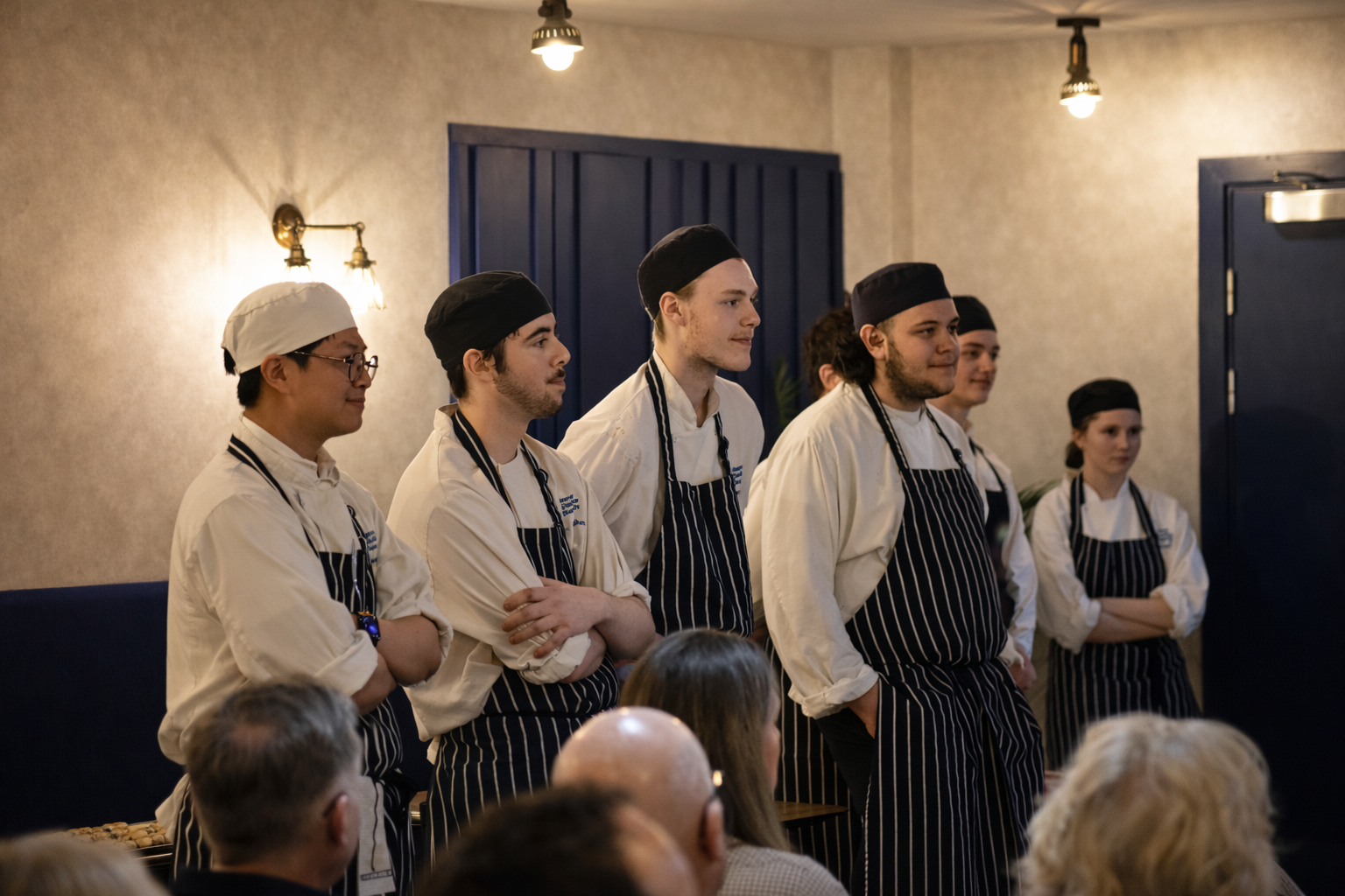 Student chefs in The Copper Pot
