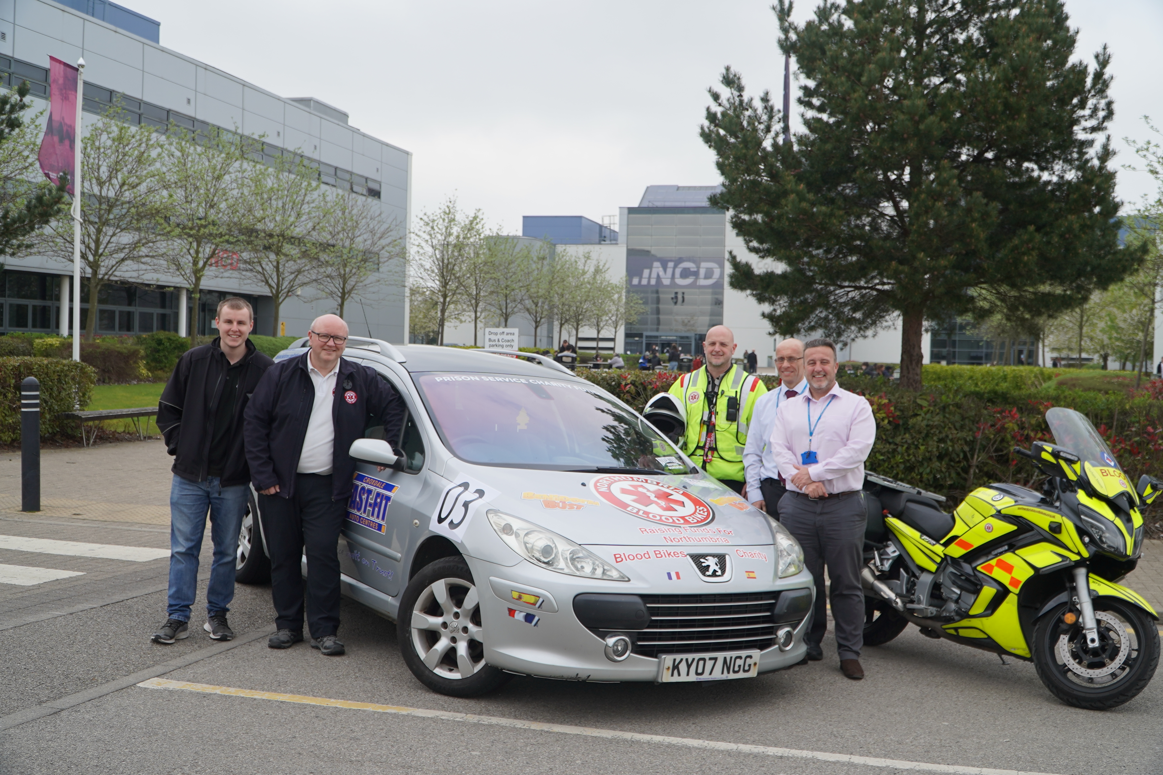 New College Durham team members stood proudly beside their Benidorm or Bust vehicle.