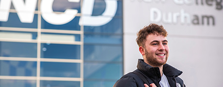 Student outside smiling 