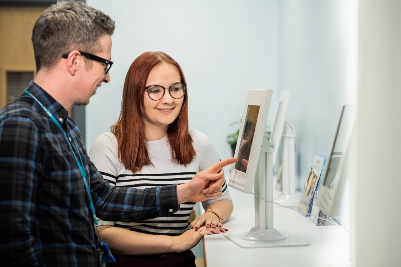 two people using a tablet